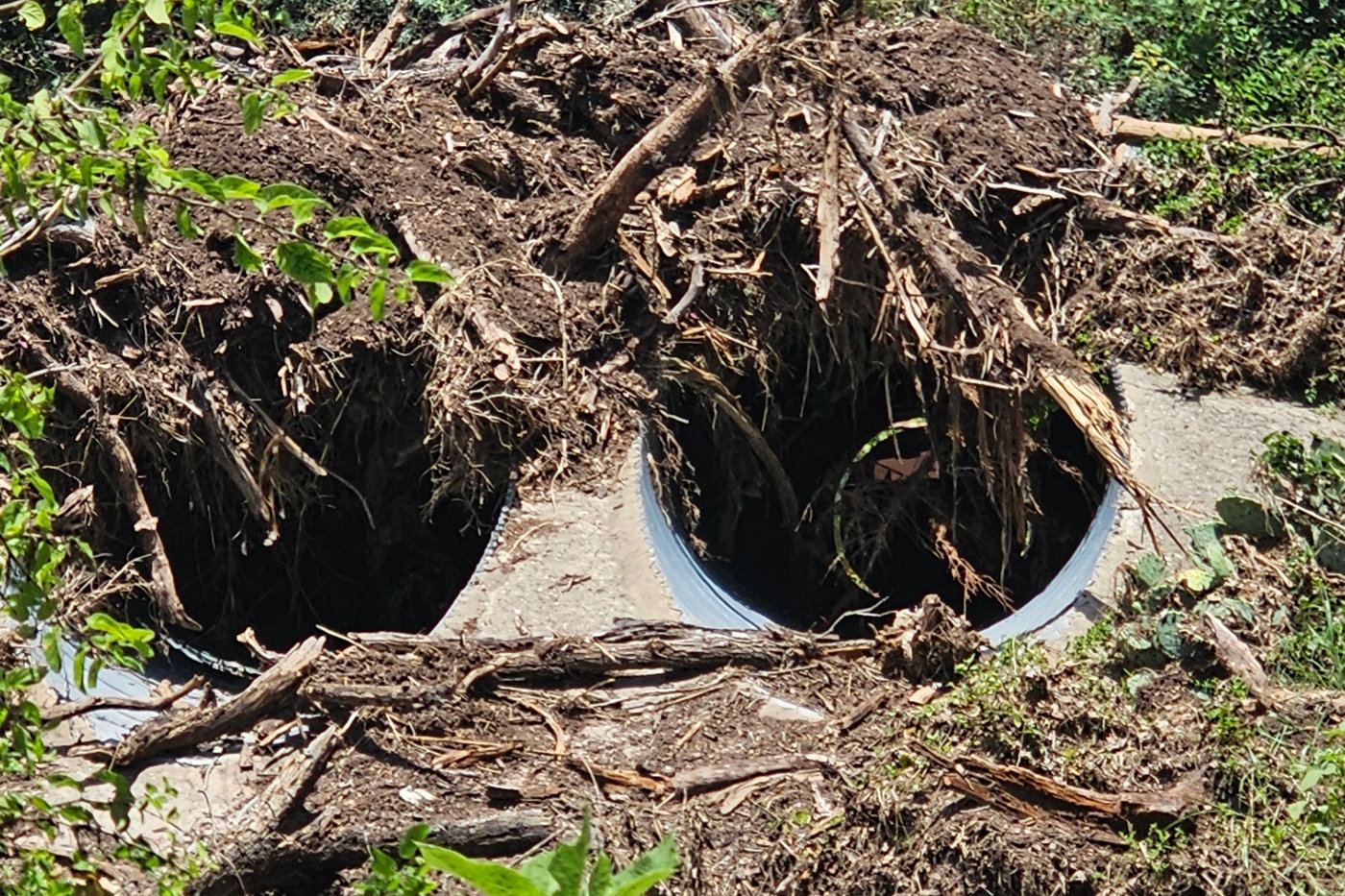 Culverts choked with storm debris